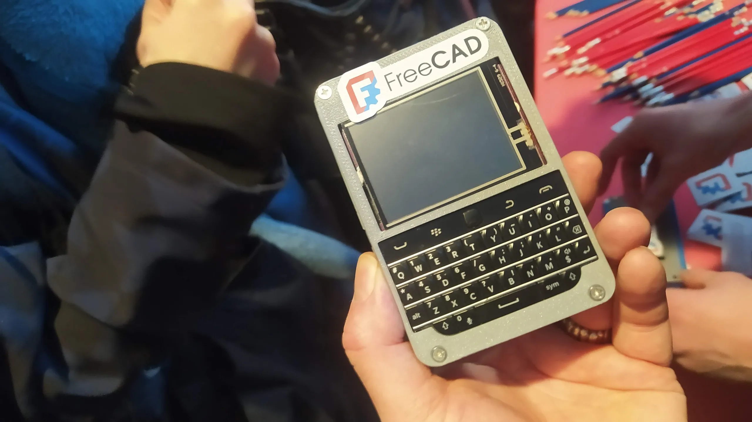 People showing home-made hardware - A FreeCAD stickered beepy